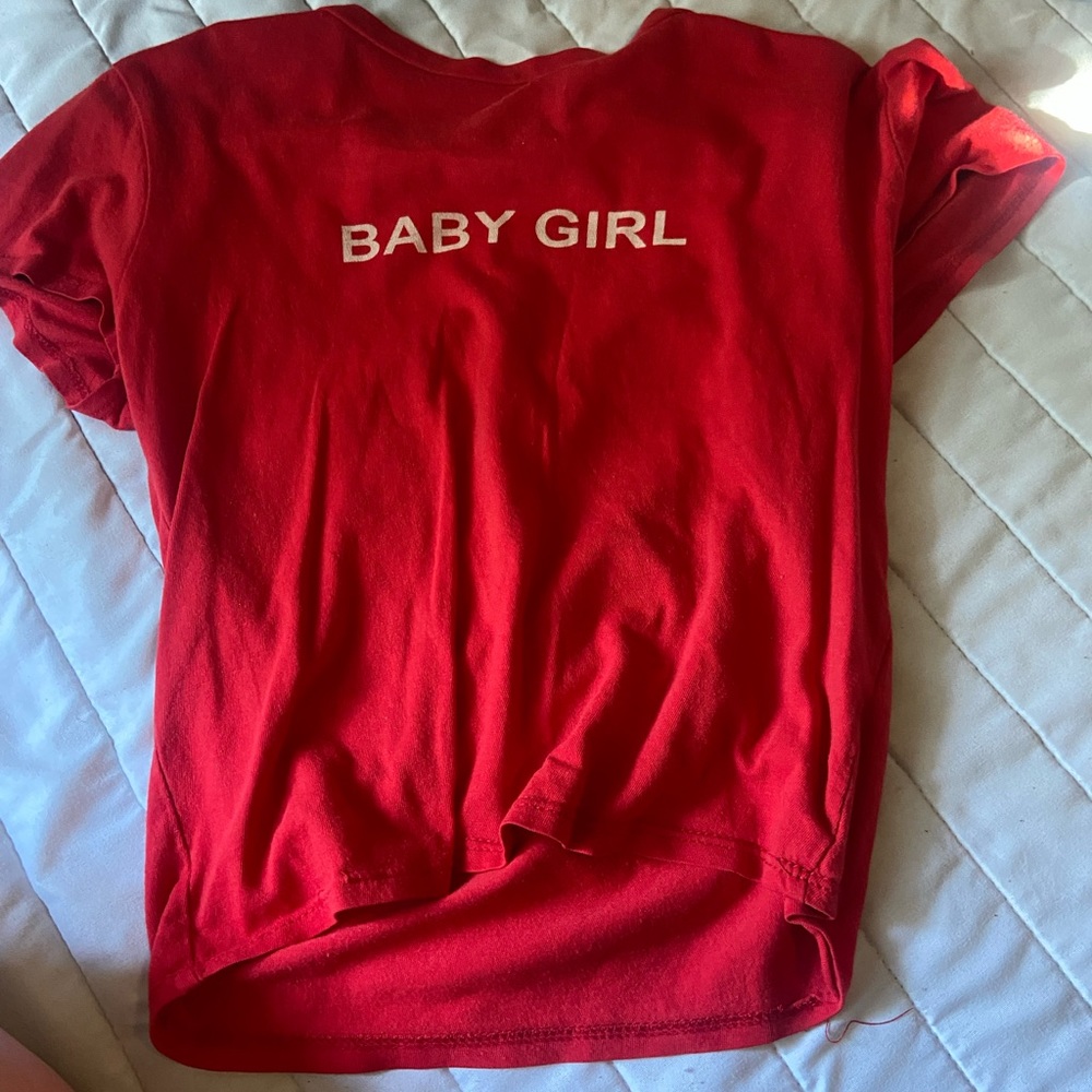 Red shirt with white wording on it | Medium